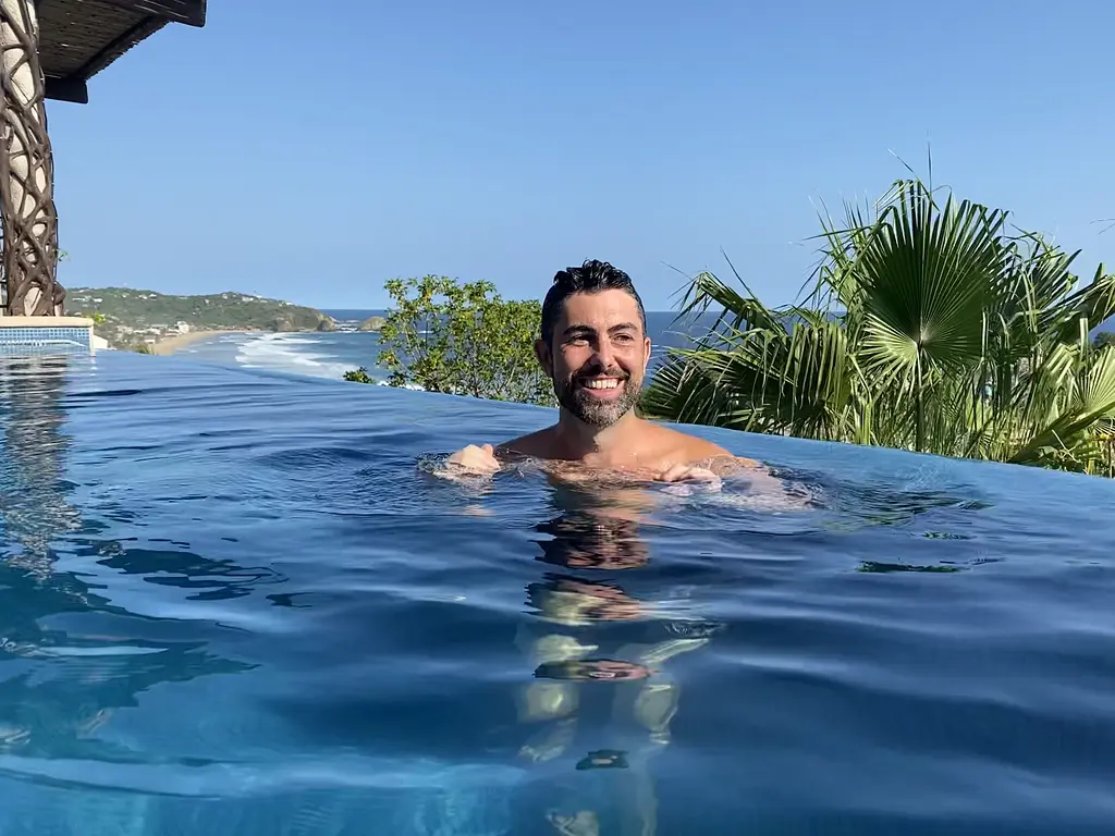 Trai enjoying the pool at Casa KalMar