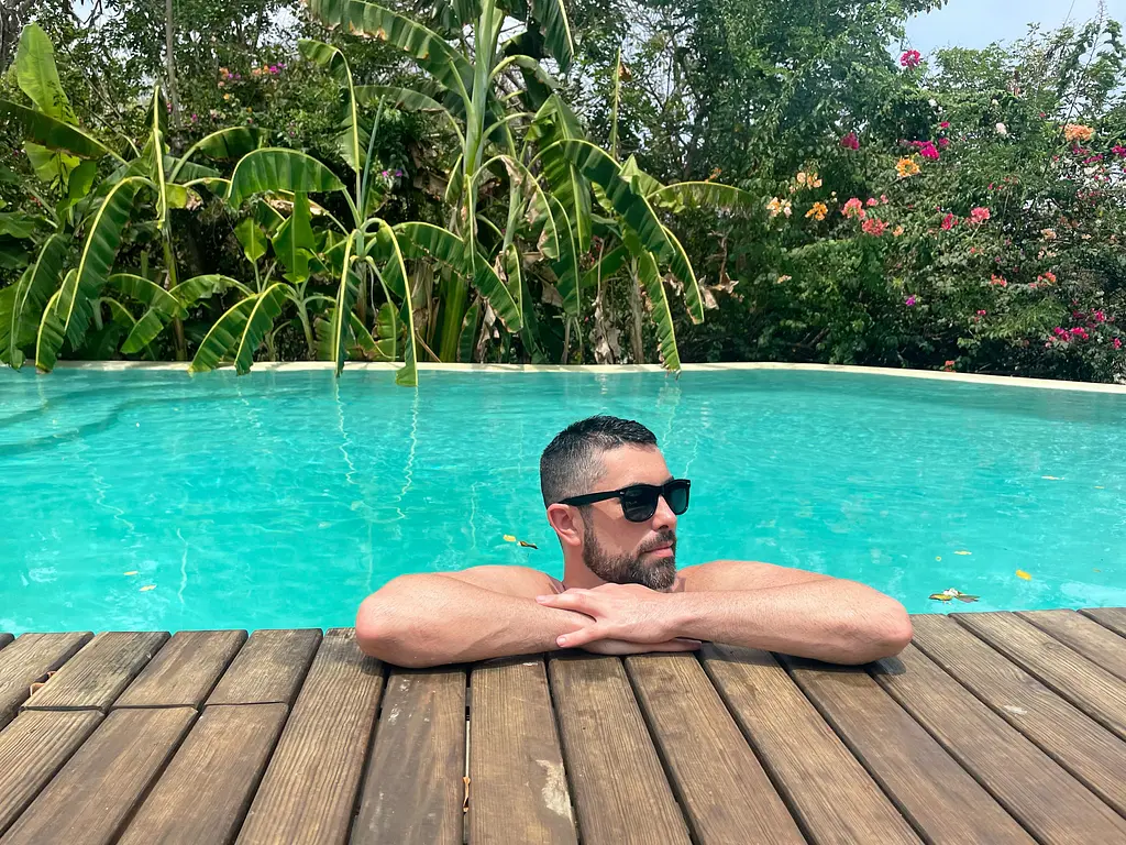 Trai enjoying the pool at El Alquimista