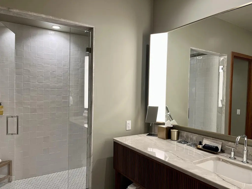 Walk-in shower with luxury bath products